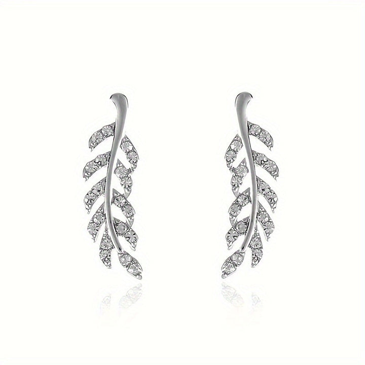 Hensleyra | Boucles d'Oreilles Élégantes en Forme de Feuille avec Design Creux et Finition Dorée