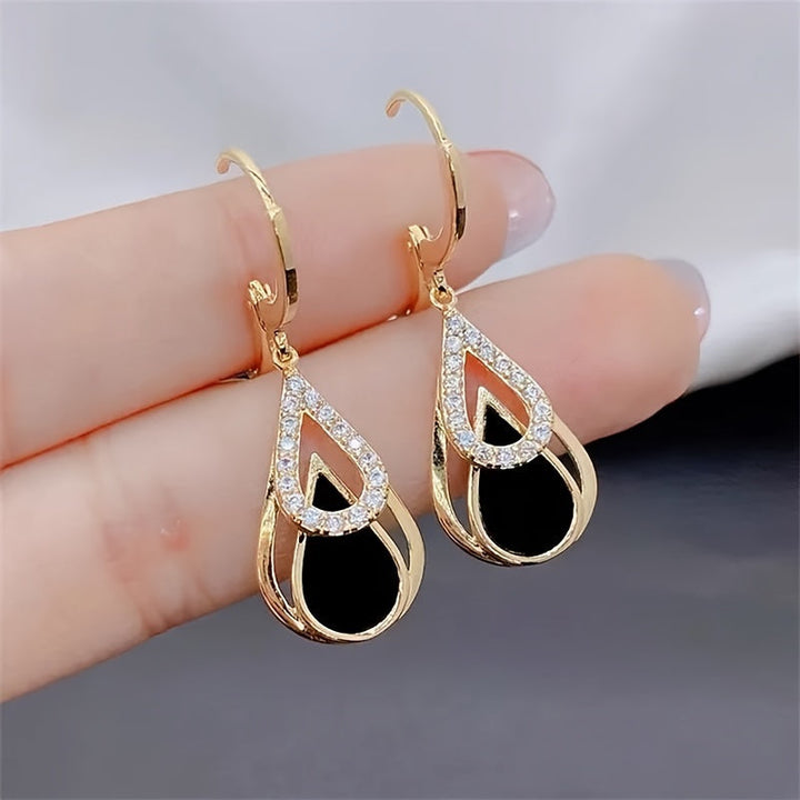 Ralia | Boucles d'Oreilles Goutte Double avec Design Découpé et Fini Élégant