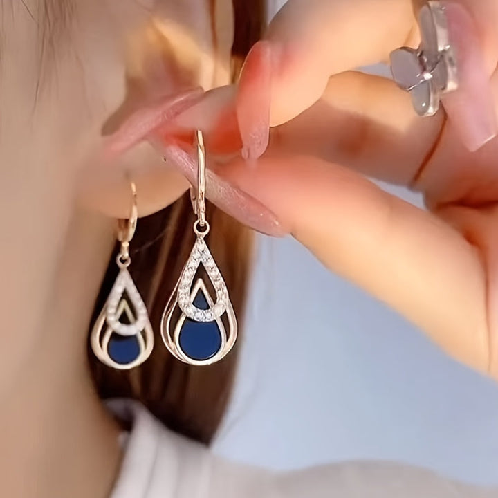 Ralia | Boucles d'Oreilles Goutte Double avec Design Découpé et Fini Élégant