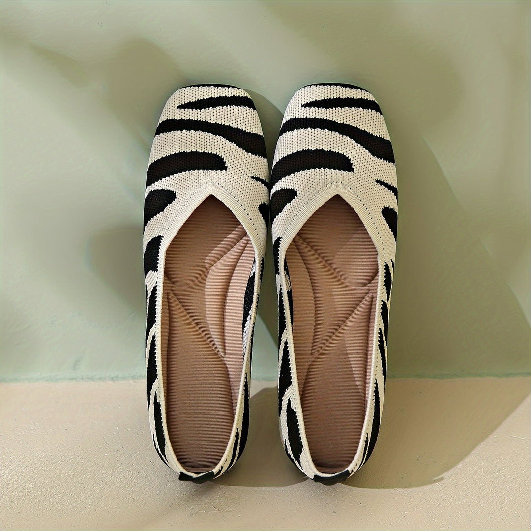Ivara | Chaussures plates slip-on à motif zèbre chic