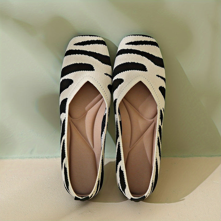Ivara | Chaussures plates slip-on à motif zèbre chic