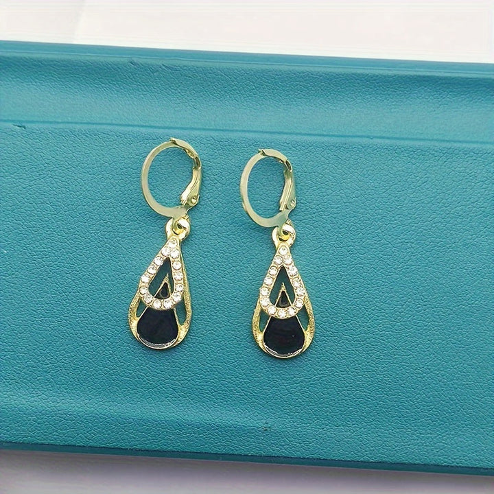 Ralia | Boucles d'Oreilles Goutte Double avec Design Découpé et Fini Élégant