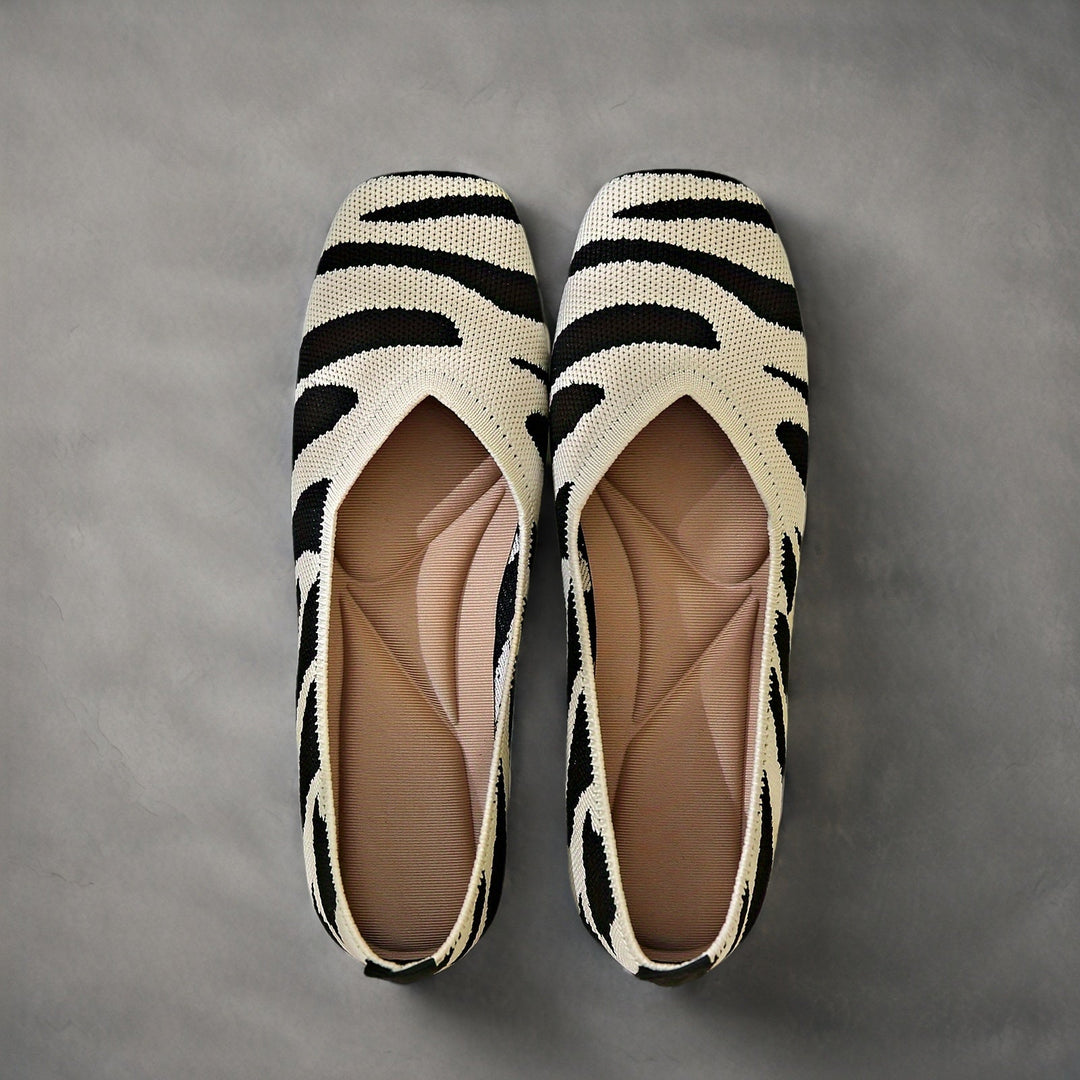 Ivara | Chaussures plates slip-on à motif zèbre chic