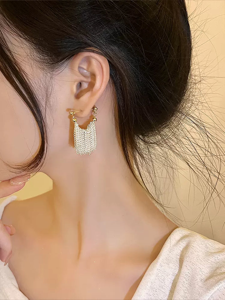 Ursa | Boucles d'oreilles, collier, bracelet avec des franges en cascade