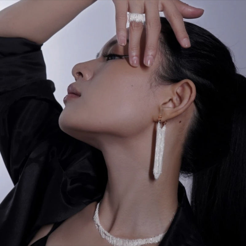 Ursa | Boucles d'oreilles, collier, bracelet avec des franges en cascade