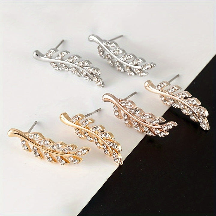 Hensleyra | Boucles d'Oreilles Élégantes en Forme de Feuille avec Design Creux et Finition Dorée