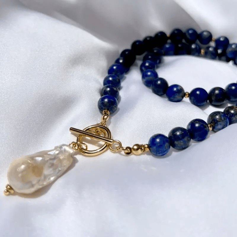 Havento | Collier Bohème Baroque aux Perles et Détails Bleu Marine
